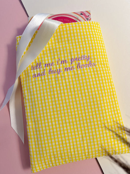 tell me I’m pretty and buy me books (lilac text) - embroidered paperback sleeve