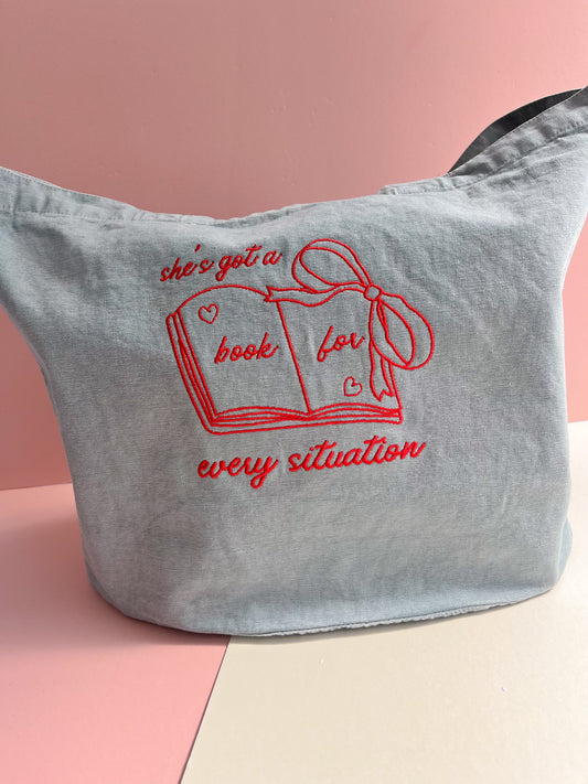 she’s got a book for every situation embroidered denim tote - DORD COLLAB