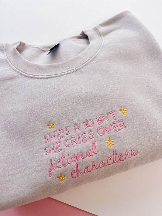 She’s a 10 but she cries over fictional characters embroidered sweatshirt