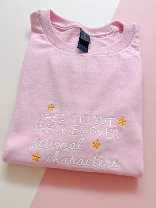 She’s a 10 but she cries over fictional characters Embroidered T-shirt