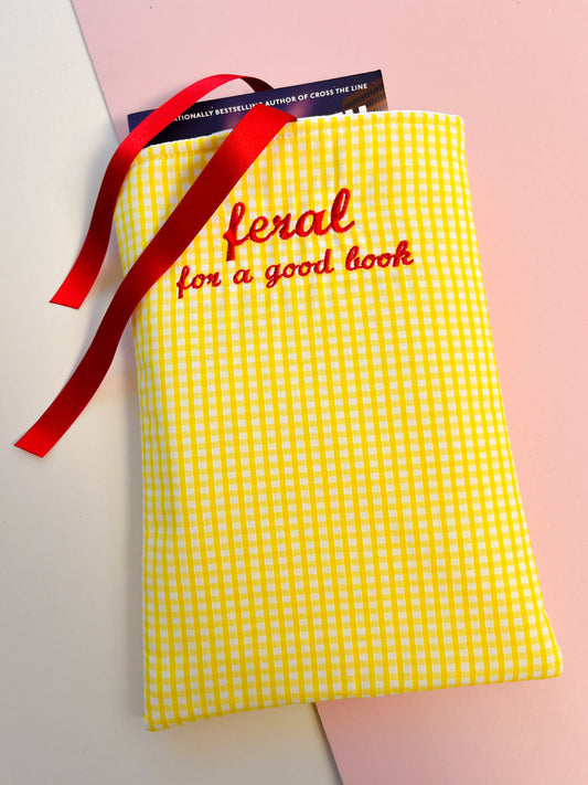 feral for a good book (red text) - embroidered paperback sleeve