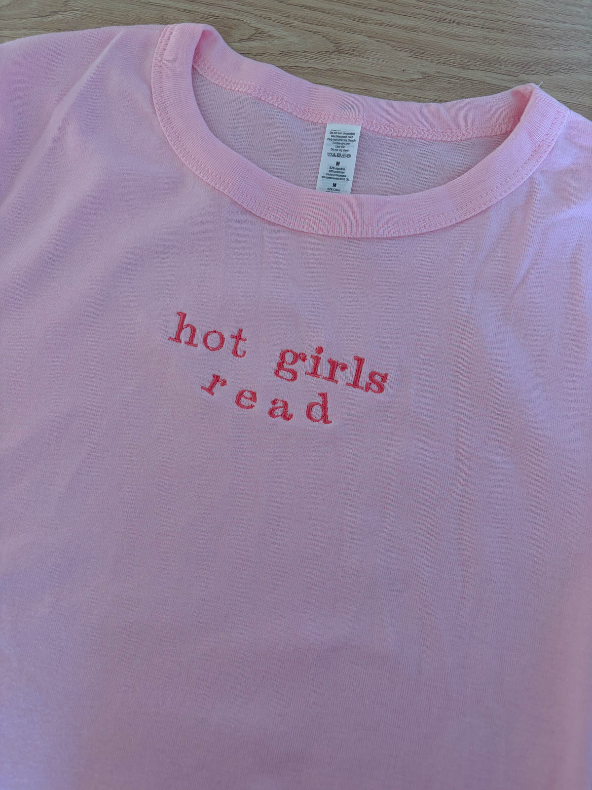 SECOND - M baby tee hot girls read