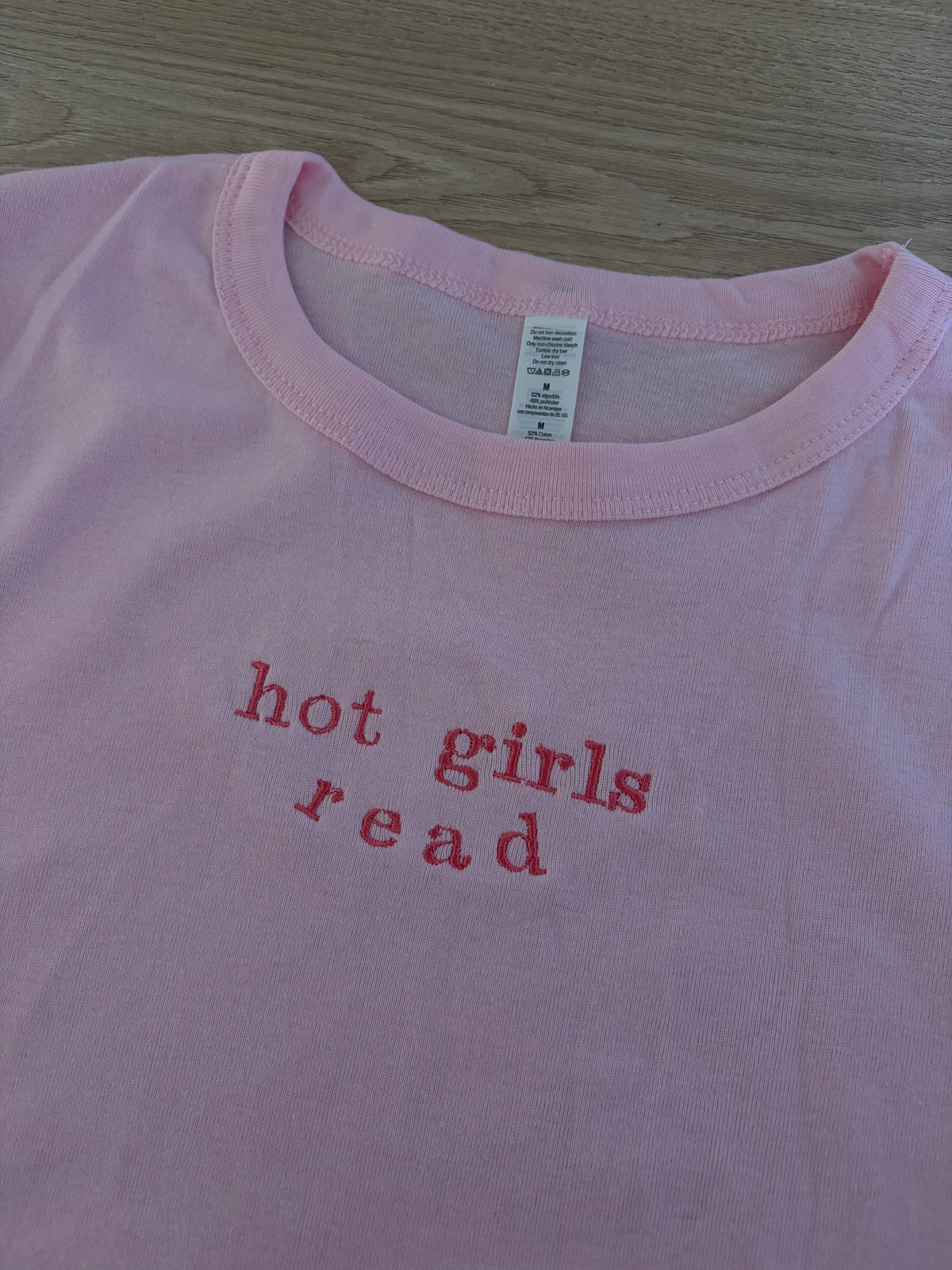 SECOND - M baby tee hot girls read