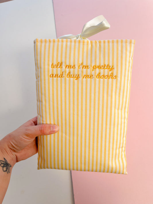 tell me I’m pretty and buy me books (peach text) - embroidered paperback sleeve