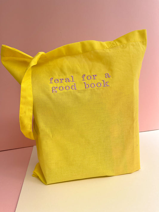 Feral for a good book embroidered tote bag