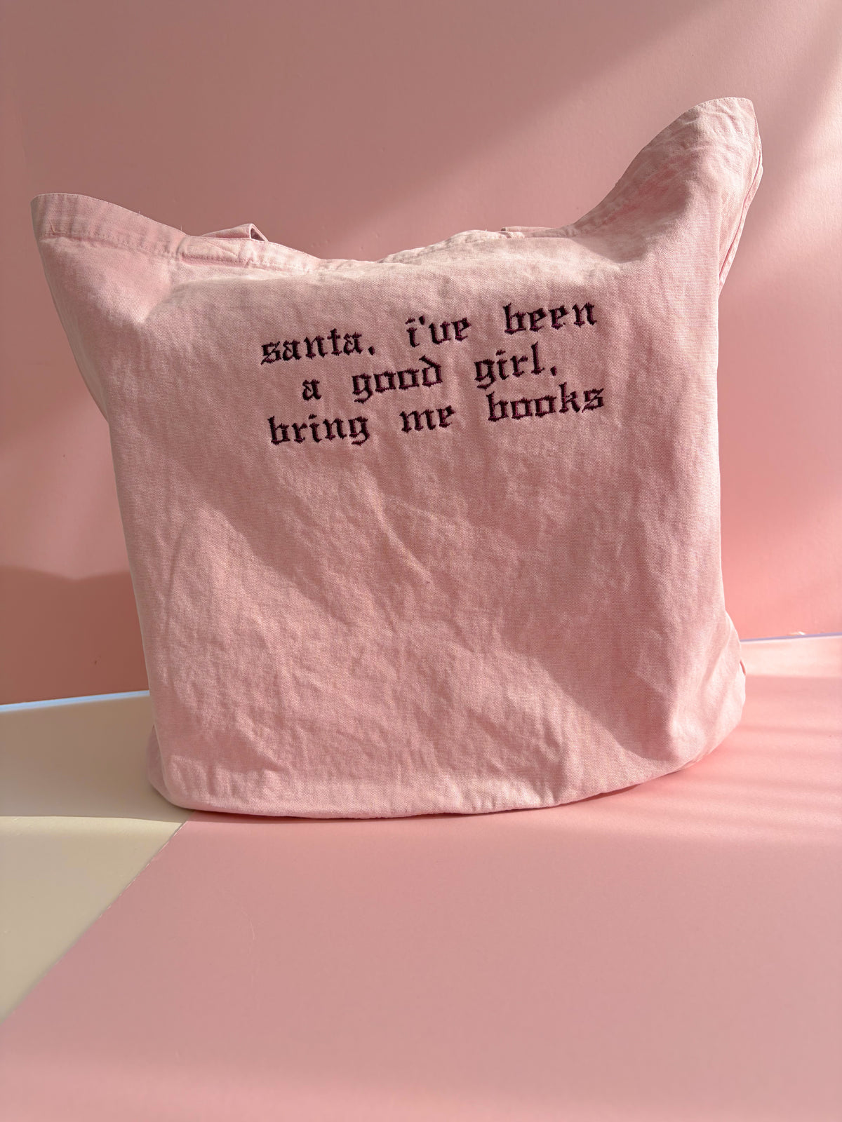 Santa, I’ve been a good girl, but me books denim tote bag