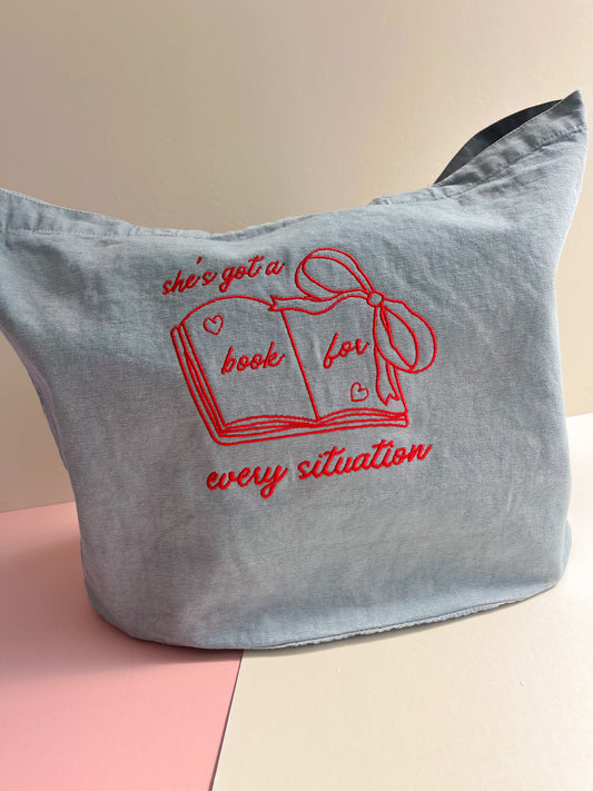 she’s got a book for every situation embroidered denim tote - DORD COLLAB