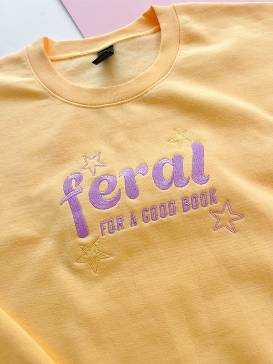 feral for a good book embroidered sweatshirt- lilac colourway