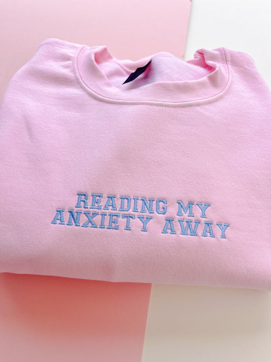 Reading my anxiety away embroidered sweatshirt