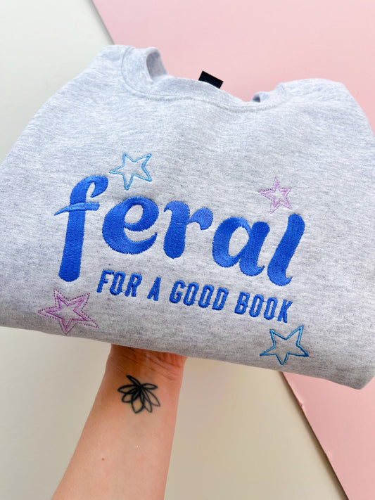 feral for a good book embroidered sweatshirt - blue colourway