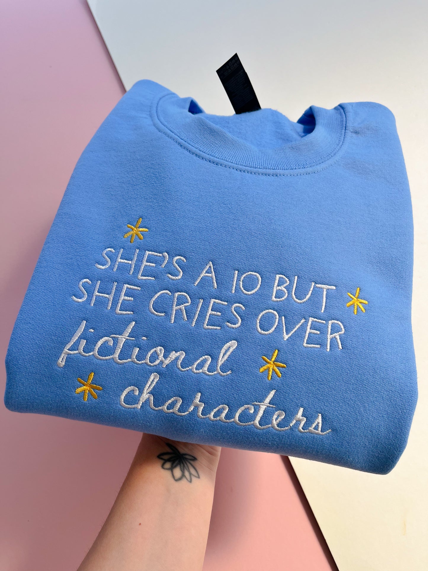 She’s a 10 but she cries over fictional characters embroidered sweatshirt
