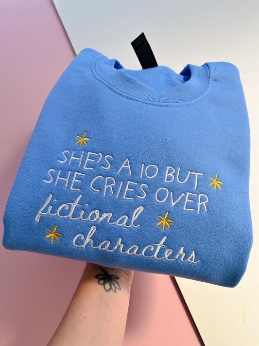 She’s a 10 but she cries over fictional characters embroidered sweatshirt