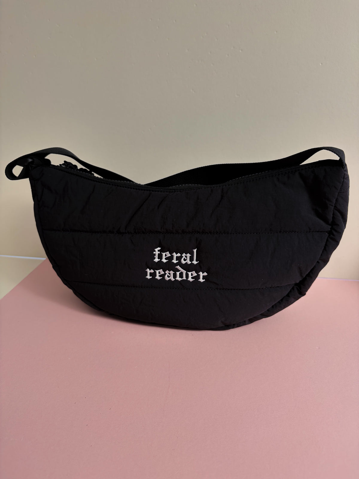 Feral reader quilted shoulder bag