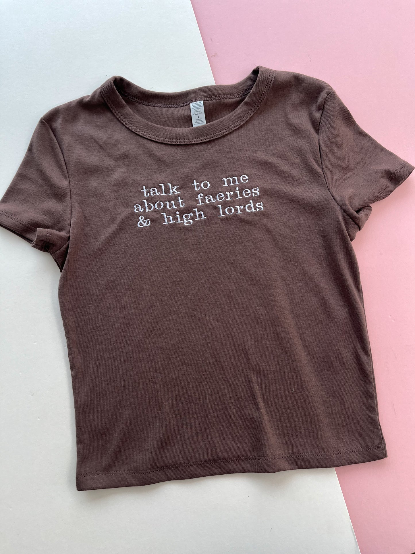 talk to me about faeries & high lords embroidered baby tee