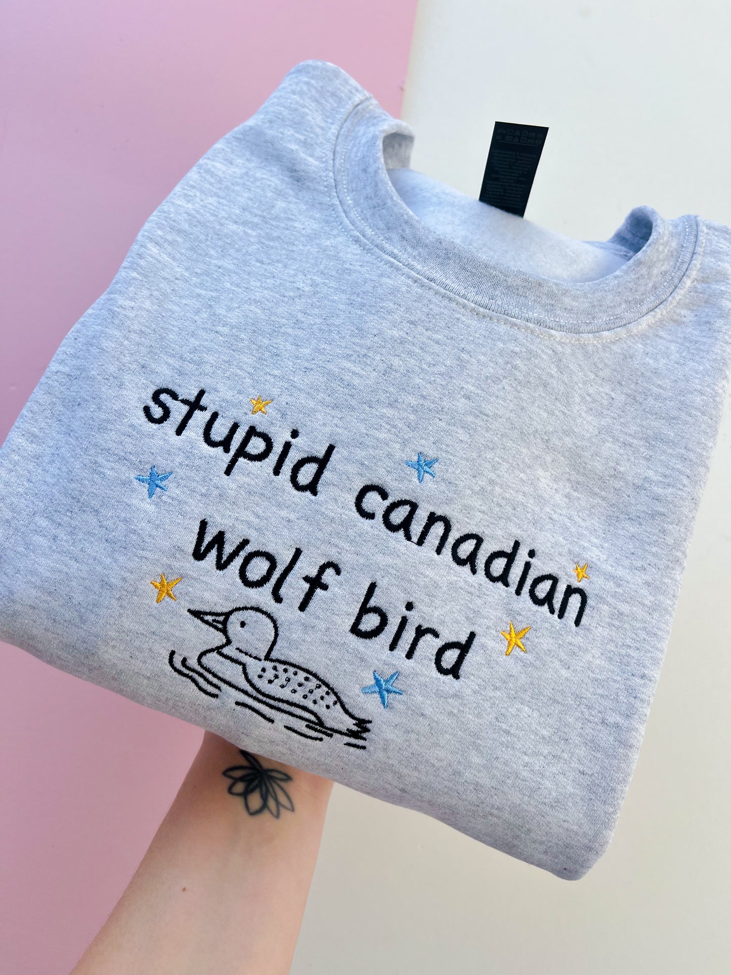 Stupid Canadian Wolf Bird Embroidered Sweatshirt
