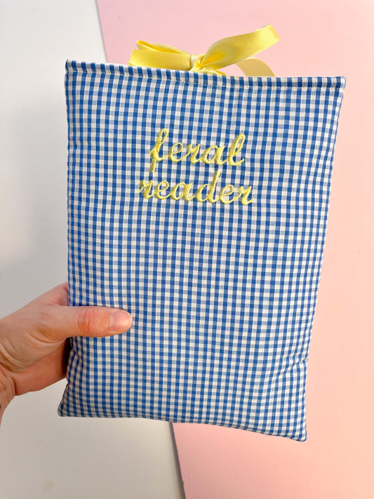 blue feral reader - embroidered paperback sleeve