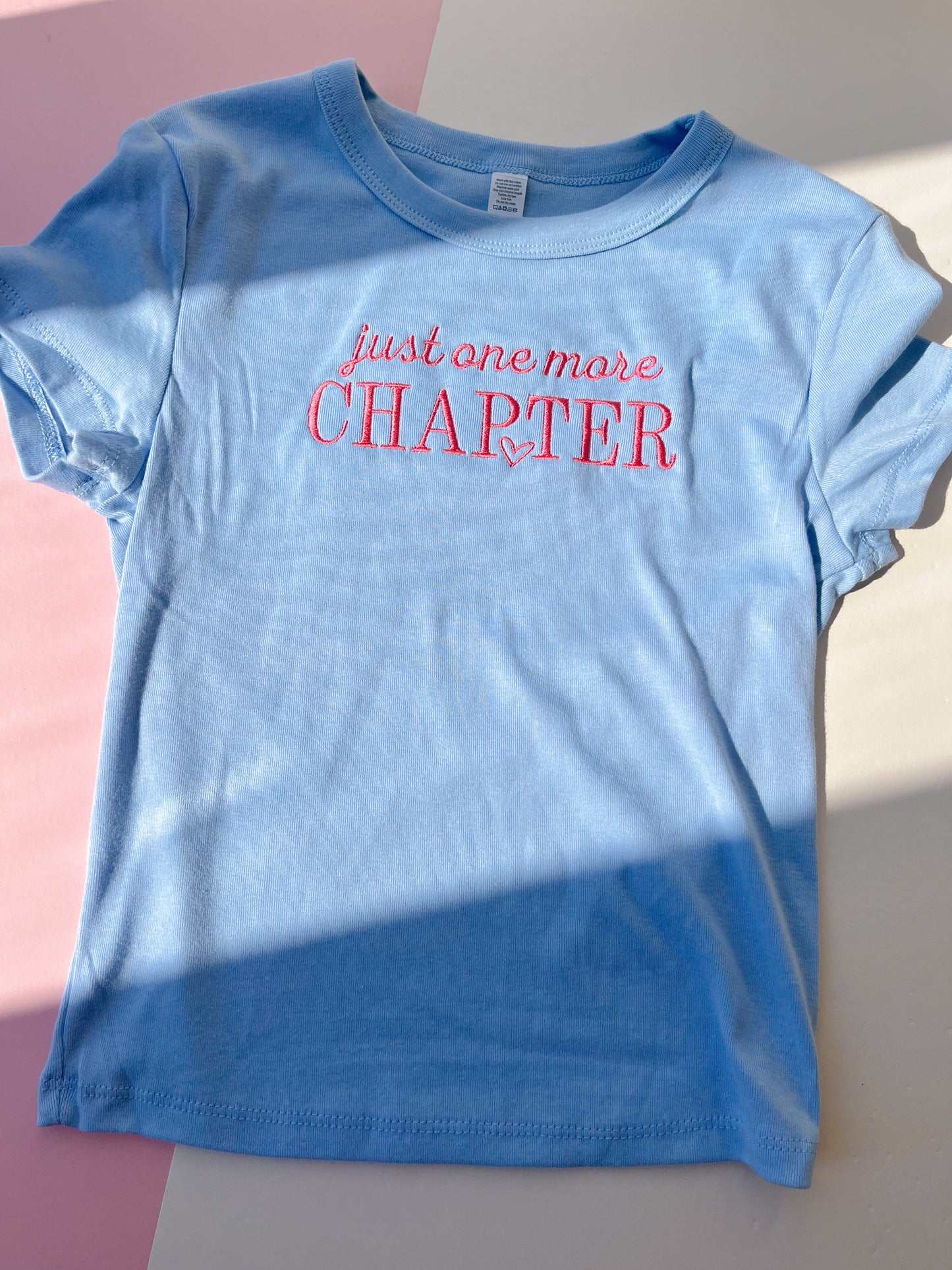 one more chapter embroidered baby tee