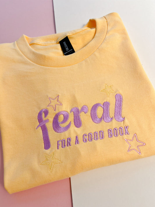 feral for a good book embroidered t-shirt - lilac colourway